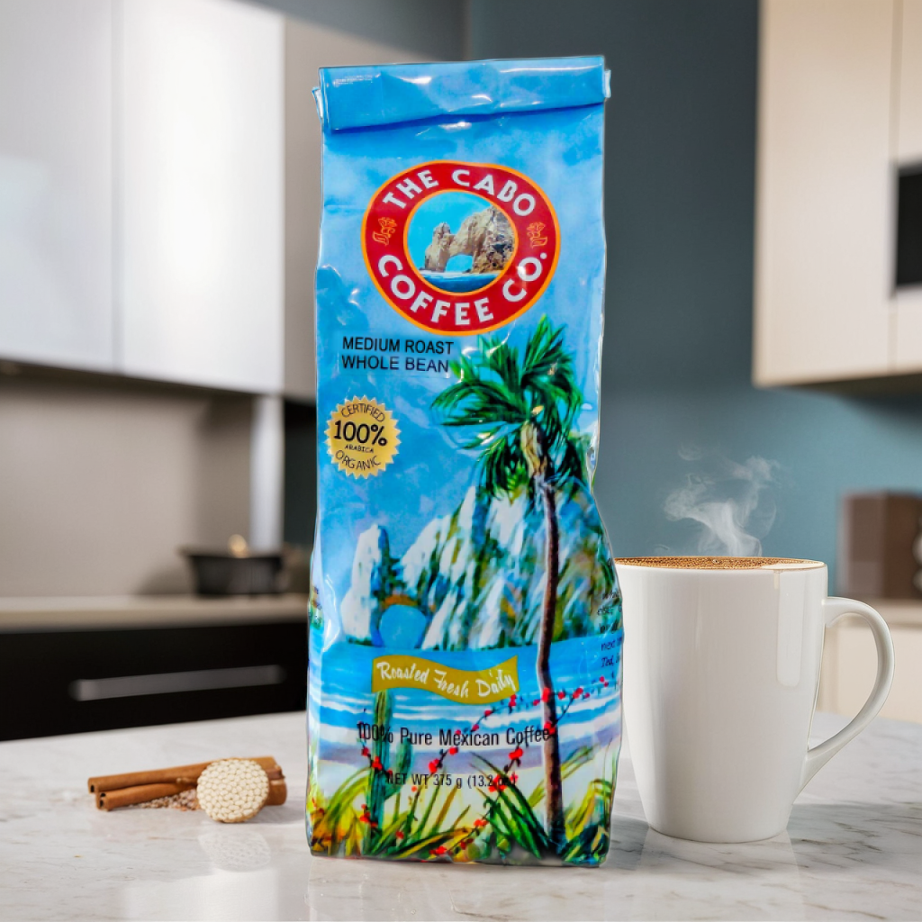 Whole Bean Medium Roast product photo prompt: a premium coffee bag labeled Whole Bean Medium Roast standing upright on a warm wooden surface with a small pile of dry, medium-roast beans in the foreground; a ceramic mug and a manual grinder softly blurred behind; cozy, artisanal feel with diffused light and film-inspired low contrast; ultra-realistic editorial product photography.